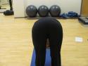 Back view of Uttanasana