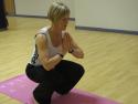 The last stage of the sequence of three poses under a heading of Utkatasana demonstrated in Cardiff