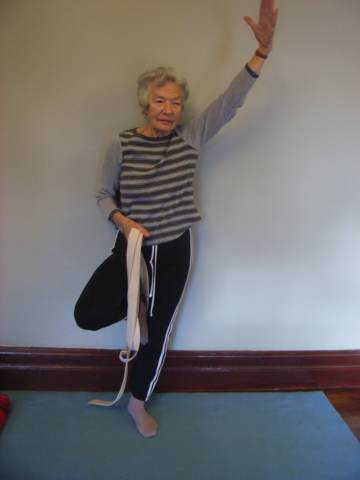 Getting better, using a belt to lift the one leg